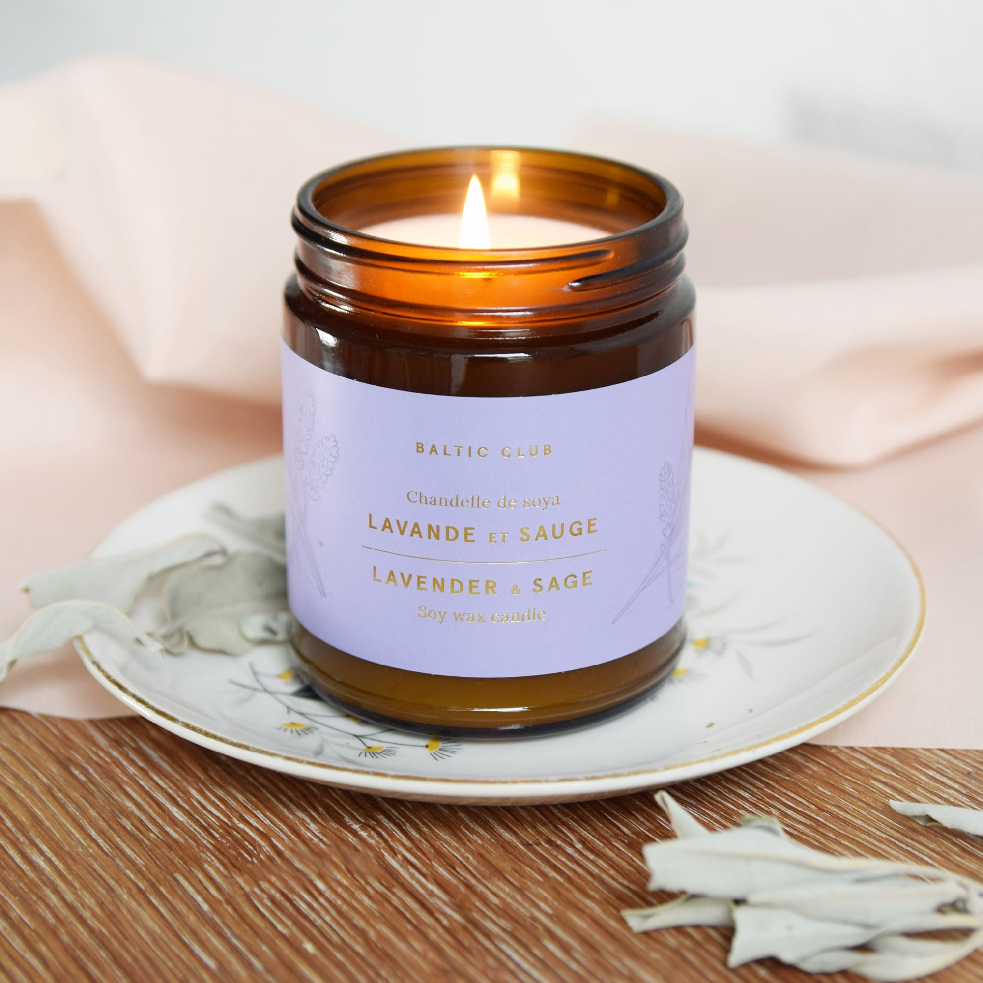 The Baltic Club's Lavender & Sage Soy Candle lit