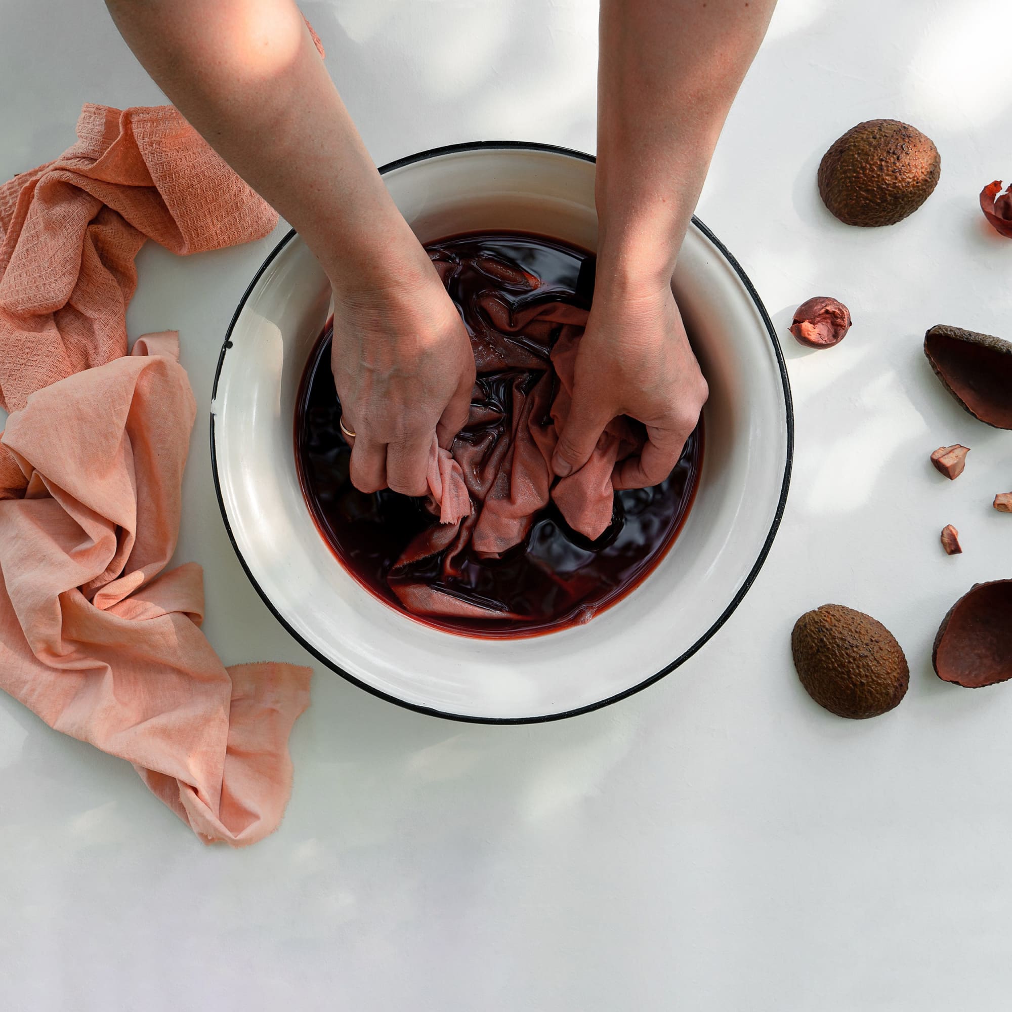 Dyeing a tea towel with avocados