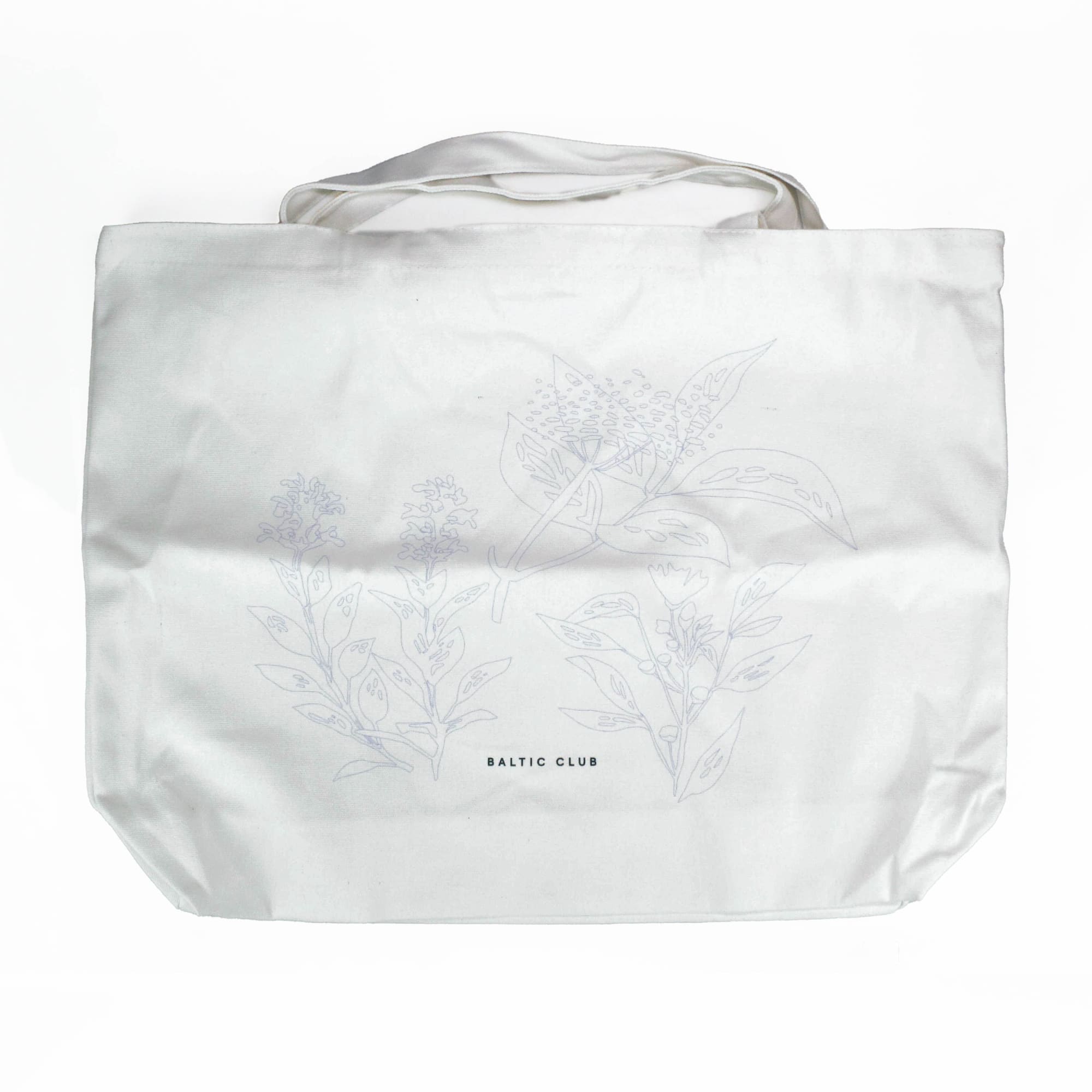 The tote bag, included in the kit, ready to be embroidered