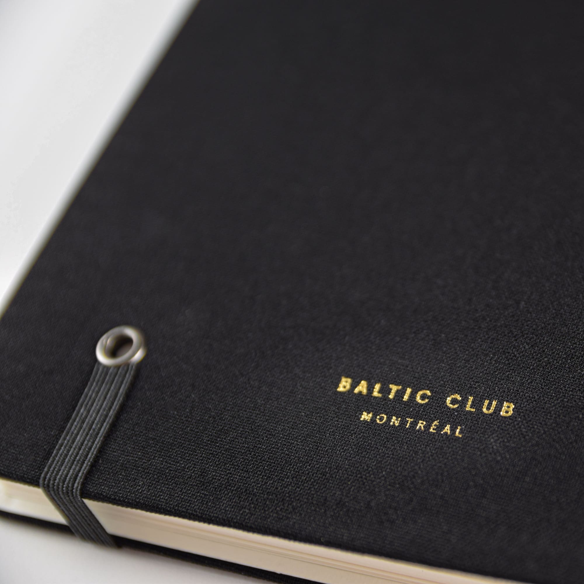 Foil stamping on the back of the Black Cloth-covered Undated Planner from The Baltic Club