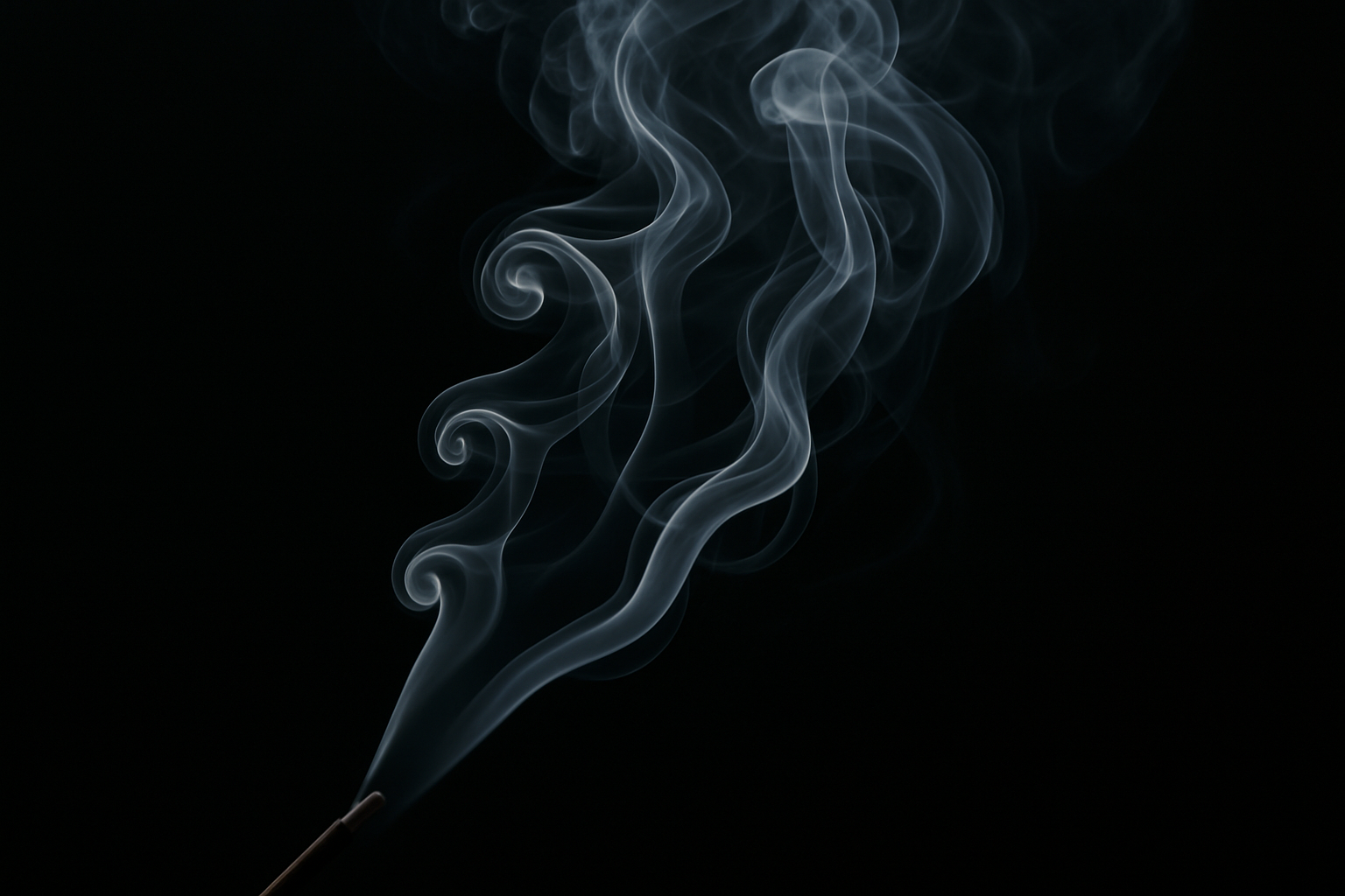 Elegant wisps of incense smoke curling softly against a deep black background