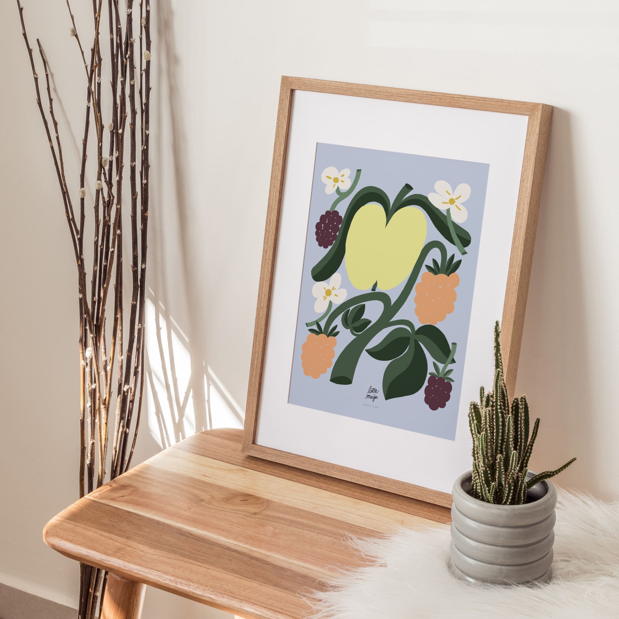 The Apple Art print from artist Lotta Maija, for the Baltic Club, in its frame