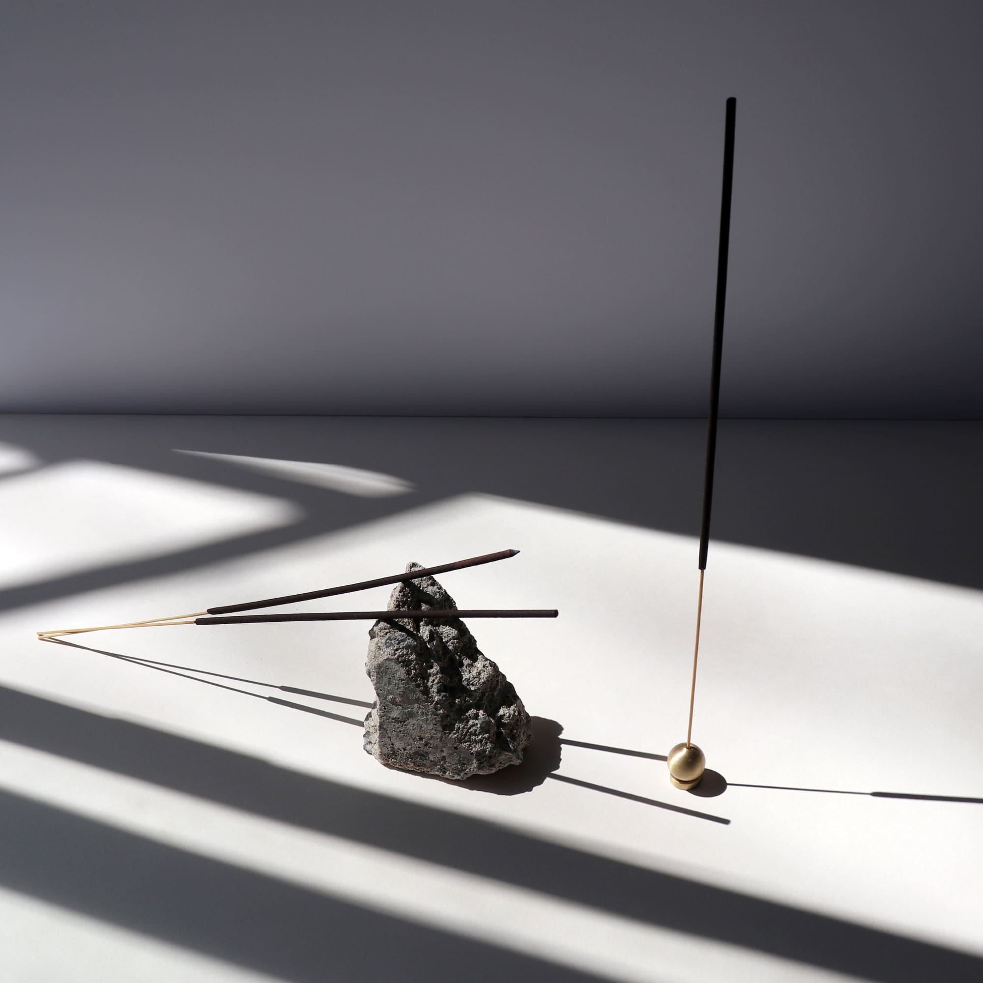 An incense stick in an incense holder